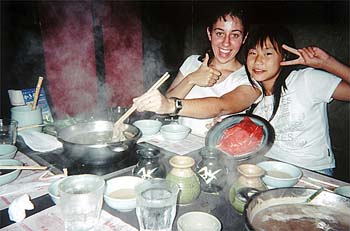 Brandi having shabu-shabu with host sister